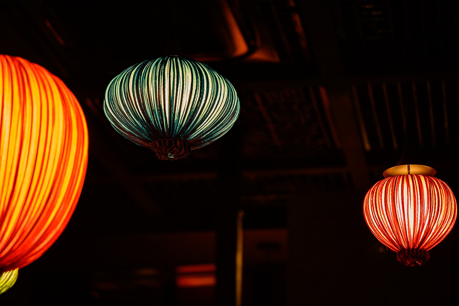 Silk lanterns glowing inside Zodiac
