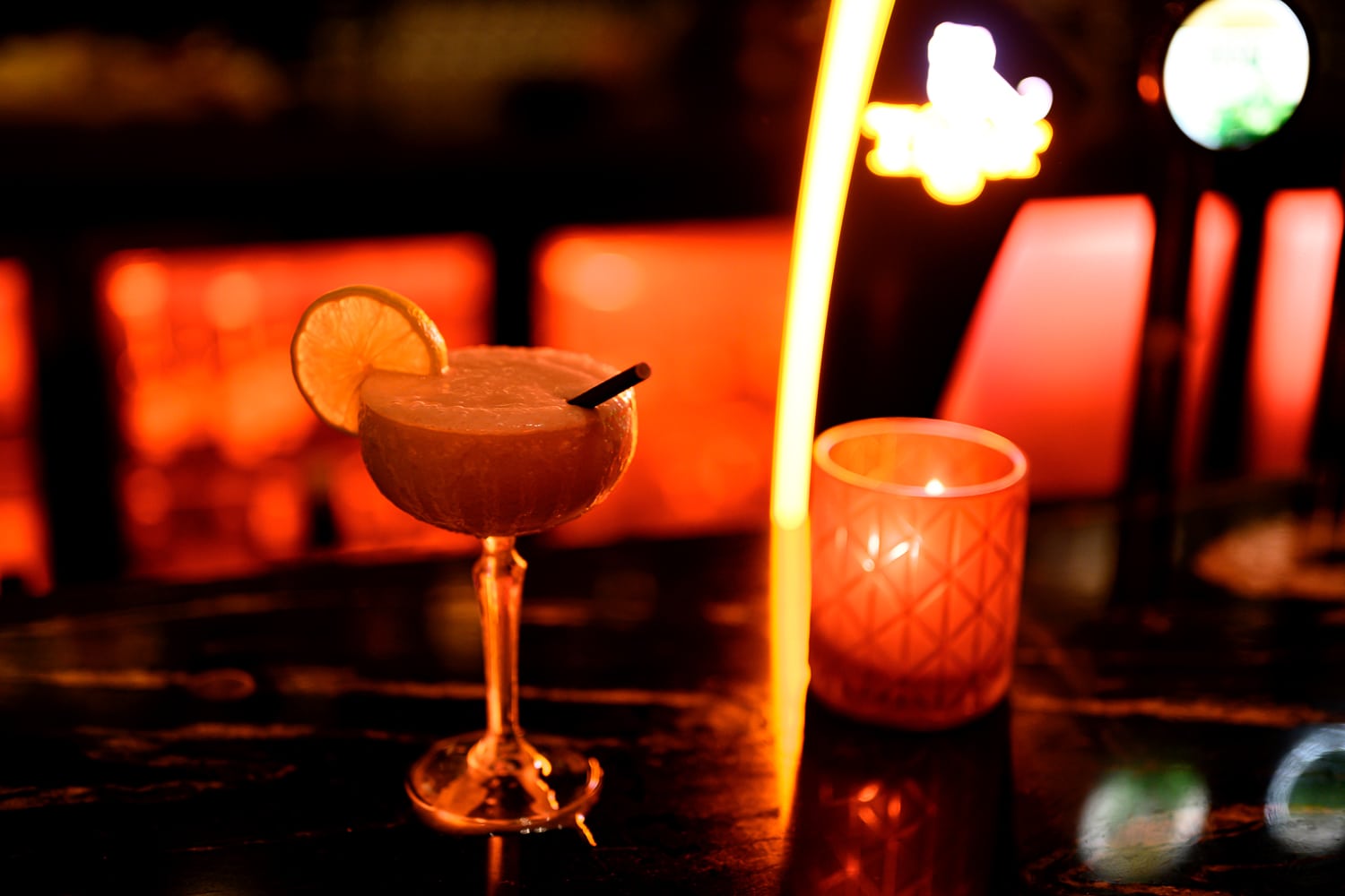 A cocktail glowing on the Zodiac bar