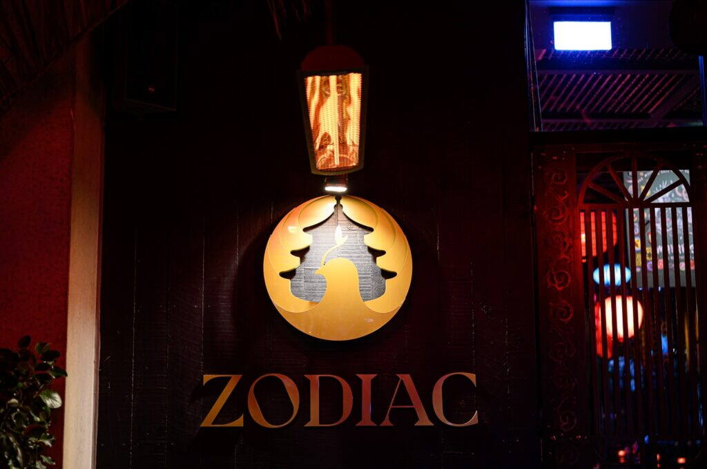 Zodiac sign beneath a lantern